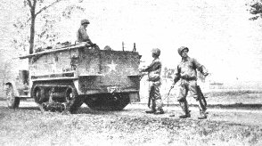 Photo: Half-track laying wire