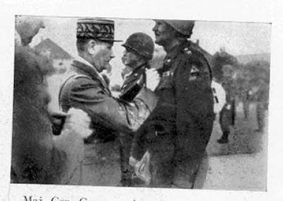 Maj. Gen. Grow receives the Croix de Guerre near Rochlitz, Germany